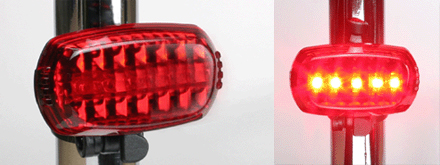 Early Cygolite red LED flashing bicycle taillight shown off and lit